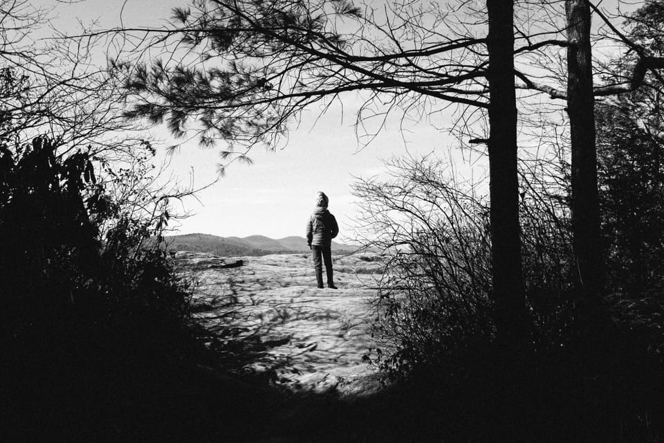 My son, Hank, standing at Sunset Rock overlooking Highlands, North Carolina.